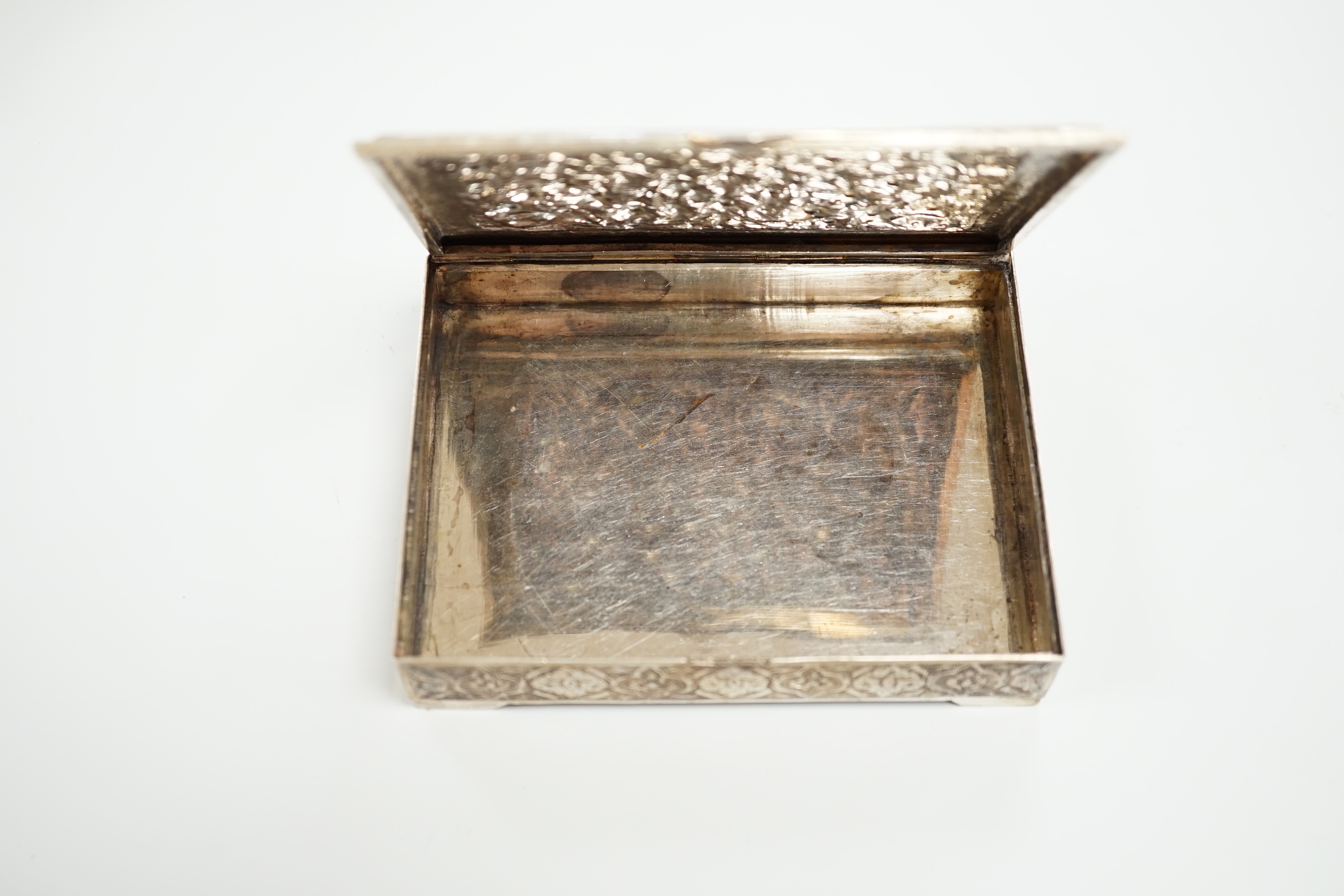 A Persian white metal rectangular box with hinged cover, 12cm, 260 grams.